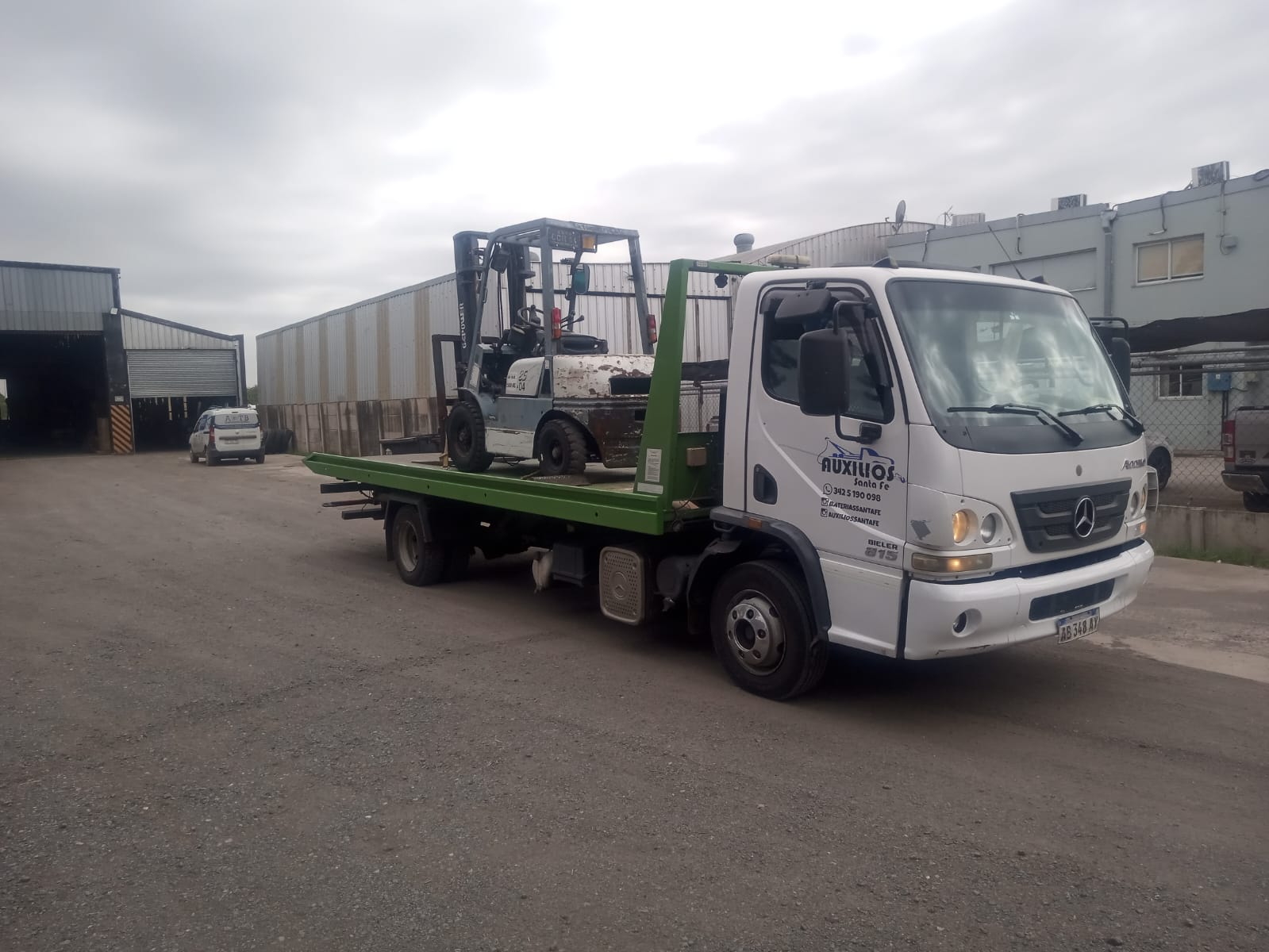 Grúa Auxilios SF trasladando vehículo en Ruta 19 KM 29, San Carlos, provincia de Santa Fe, Argentina